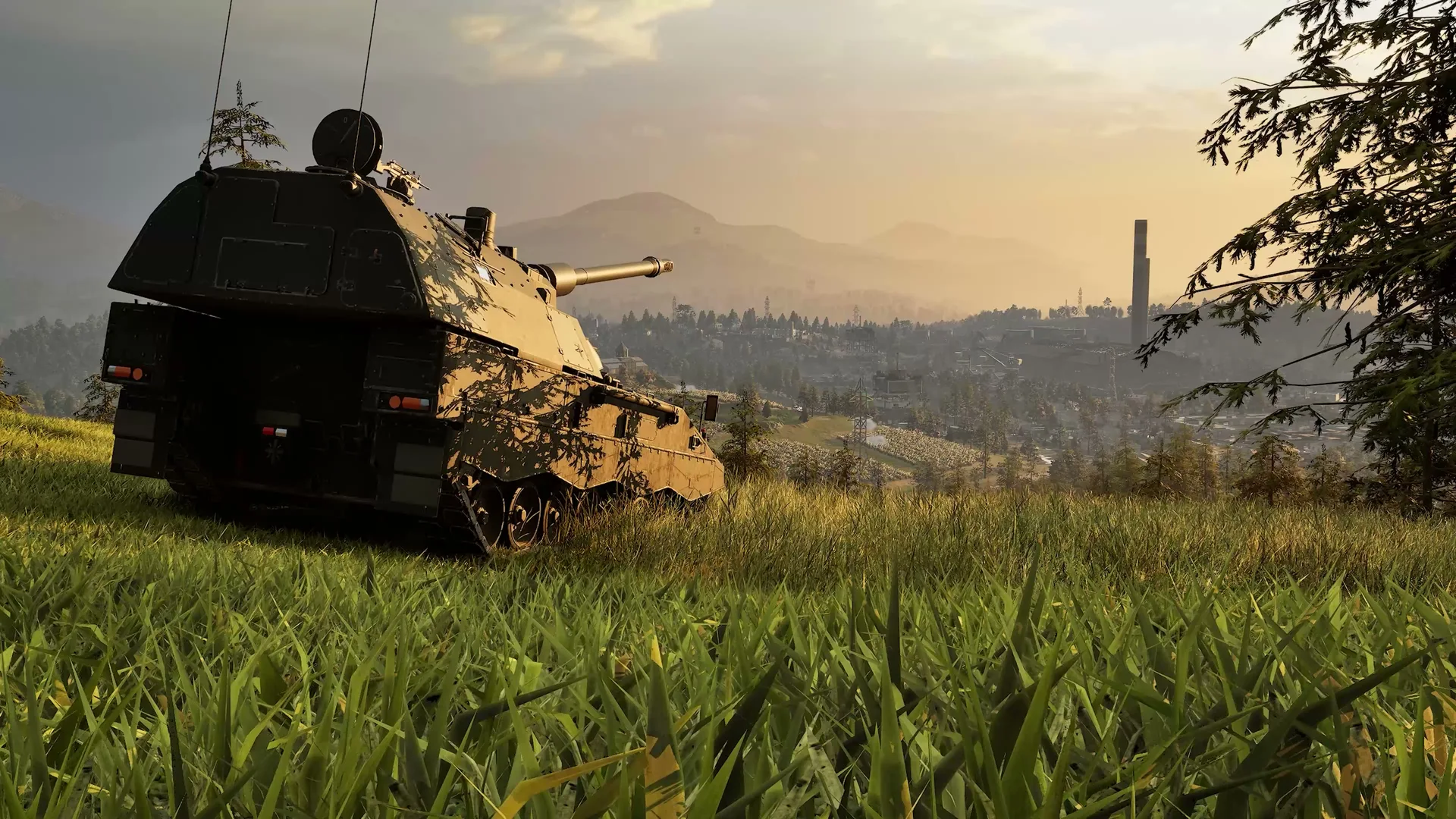 An artillery vehicle in a grassy field in the official WARDOGS reveal trailer.